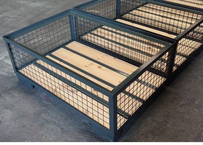 Dark grey stillage with timber deck